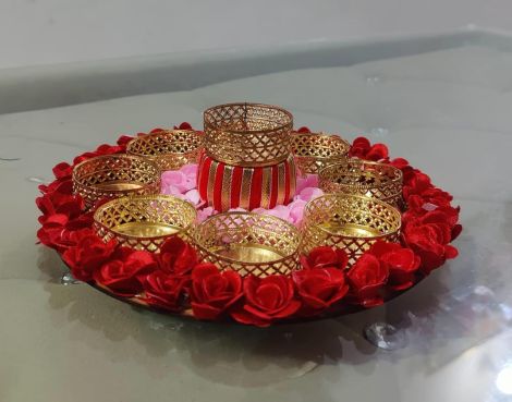 Decorative Diwali Rangoli with Artificial Flowers and Golden Tealight Holders for Home & Pooja